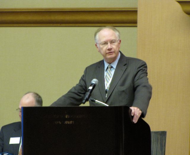 Illinois Supreme Court Chief Justice Thomas Kilbride discusses e-filing during Saturday's Assembly meeting.