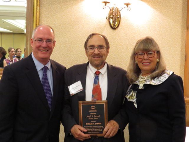 Bernie Shapiro (center) receives the 2013 Bartylak Award from outgoing ISBA President John E. Thies and incoming ISBA President Paula H. Holderman.
