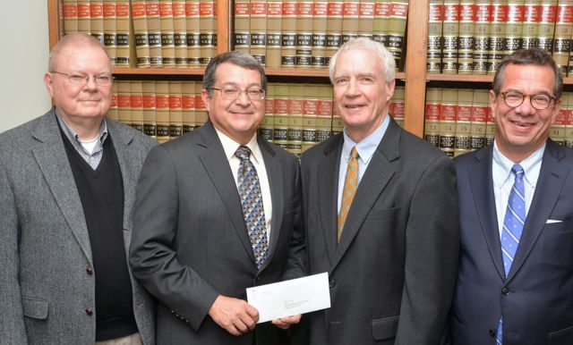 Shown here at the recent check presentation to the Ward F. McDonald Scholarship Fund in ATG’s Champaign office are (from left to right): Ward McDonald; Professor John Colombo, the Albert E. Jenner, Jr. Professor of Law and the College of Law interim dean; Jerry Gorman, ATG senior vice president and current adjunct professor at the College of Law; and Peter J. Birnbaum, ATG president and chief executive officer.